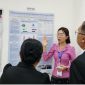 Hongkham Xayavong (Lao TPHI) presenting her team’s poster on the nutritional status of adolescent students in Lao PDR